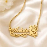 Gold-tone fairy silhouette name pendant on ivory satin