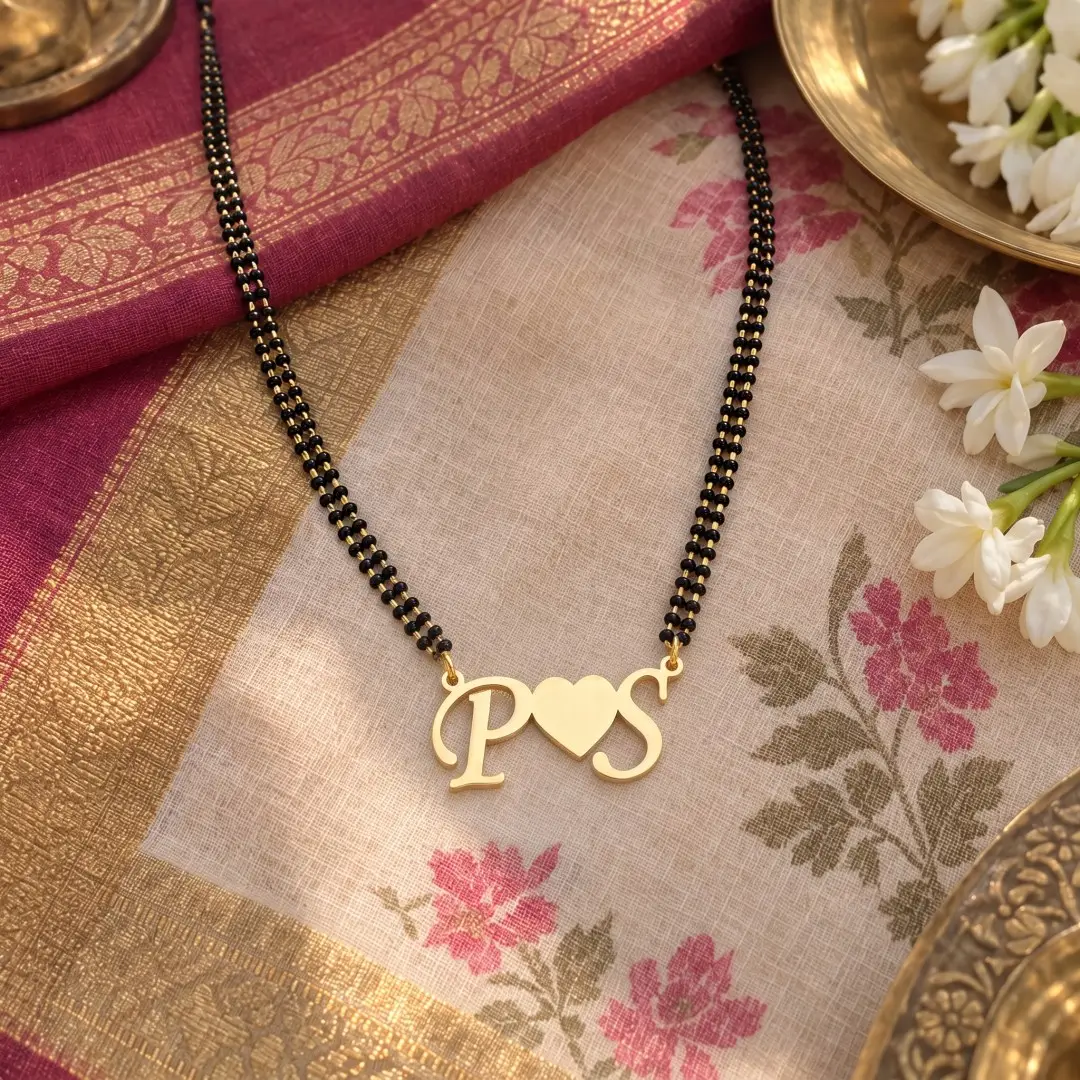 Heart Initials Couple Necklace - With a black-beaded chain on floral fabric Heart Initials Couple Necklace with a black-beaded chain on floral fabric