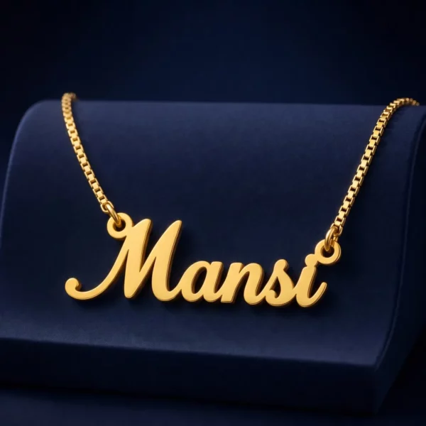 Gold-tone simple script name necklace on a navy velvet display
