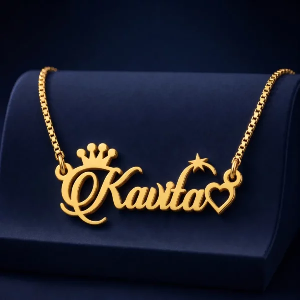 Gold-tone name necklace with crown, star and heart accents on a navy velvet display