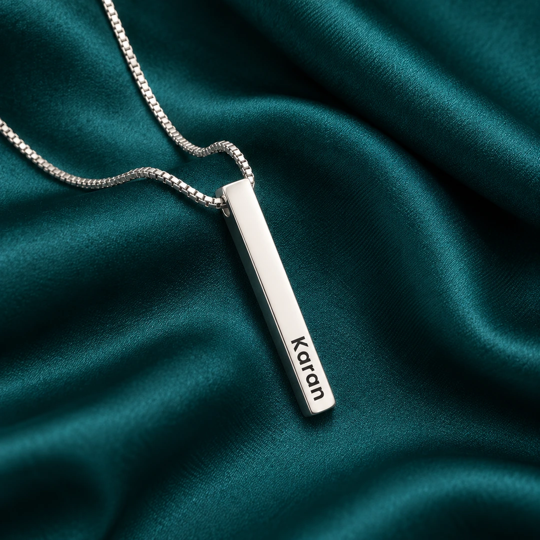 Personalized Silver Finish 3D Bar Pendant - On dark green fabric Personalized Silver Finish 3D Bar Pendant on dark green fabric