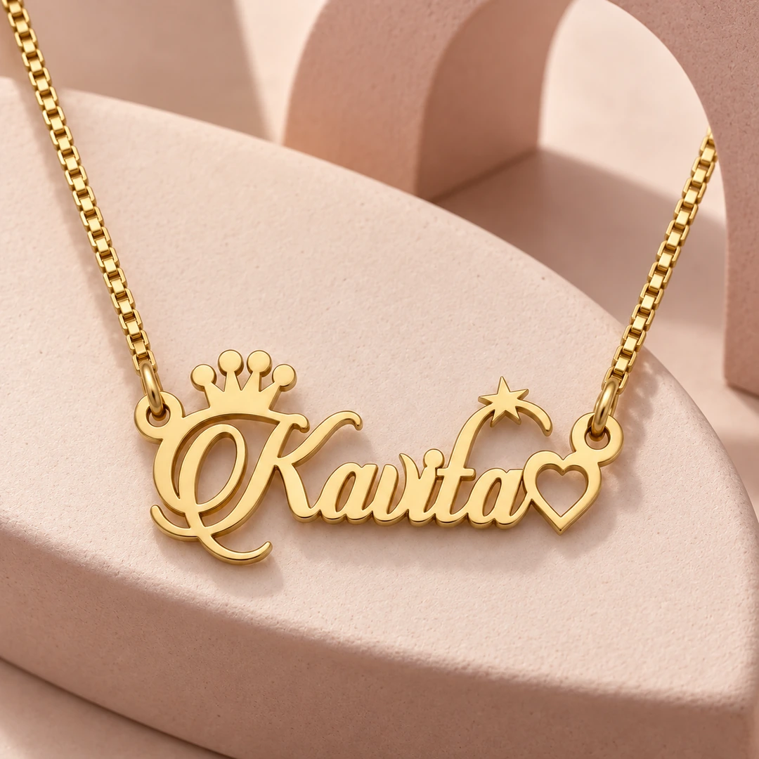 Crown, Star and Heart Name Necklace - On a pink display Crown, Star and Heart Name Necklace on a pink display