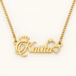 Crown, Star and Heart Name Necklace on an cream background