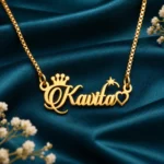 Crown, Star and Heart Name Necklace on dark green fabric