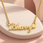 Curved Heart Name Necklace on a pink display