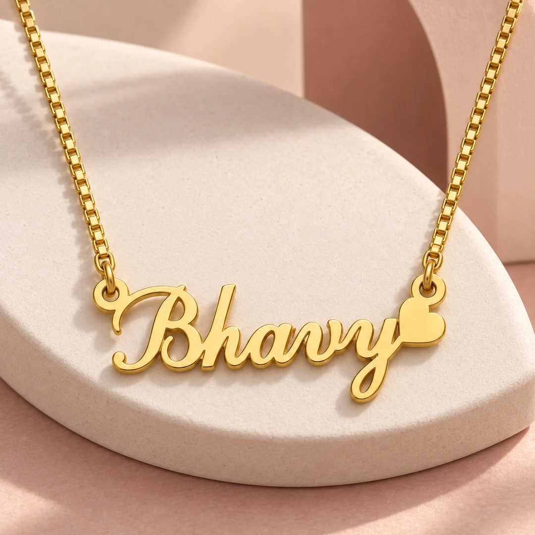 Curved Heart Name Necklace - On a pink display Curved Heart Name Necklace on a pink display
