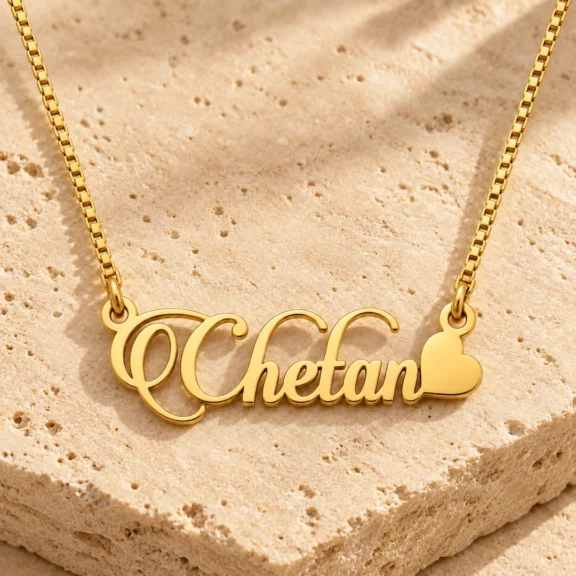 Stylish Heart Name Necklace on a rough stone surface