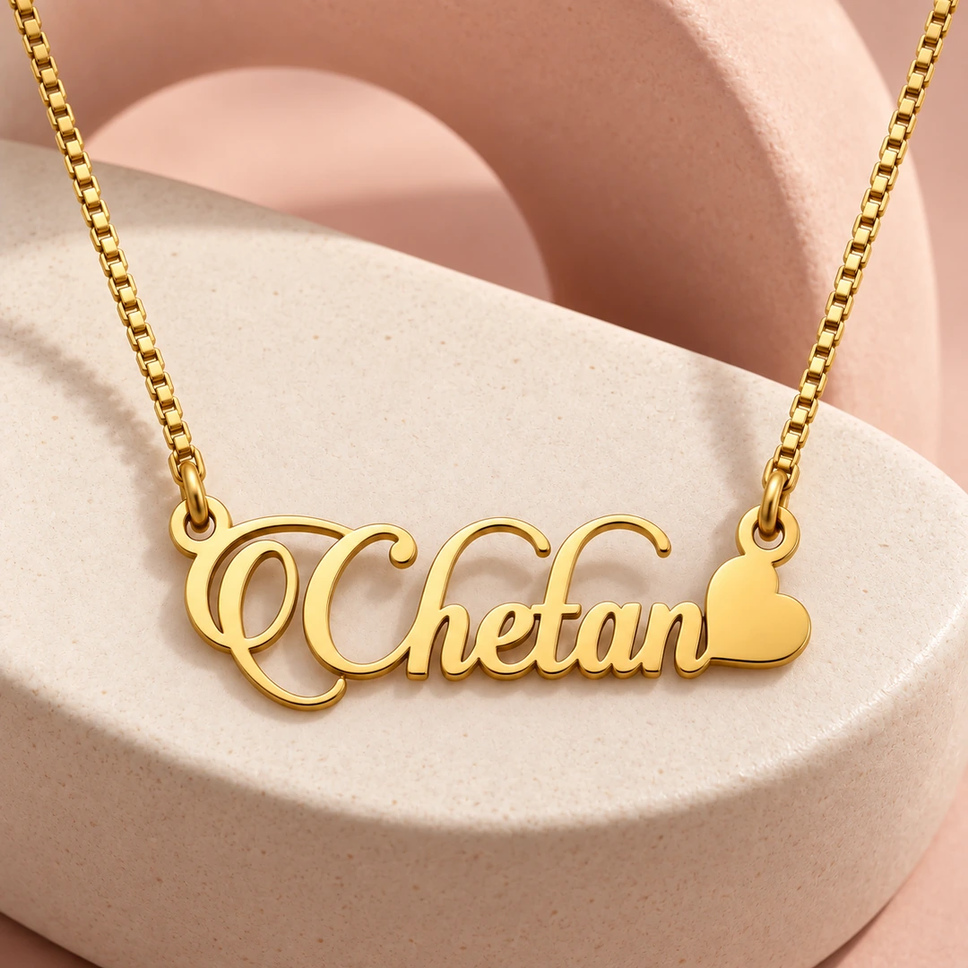 Stylish Heart Name Necklace - On a pink display Stylish Heart Name Necklace on a pink display