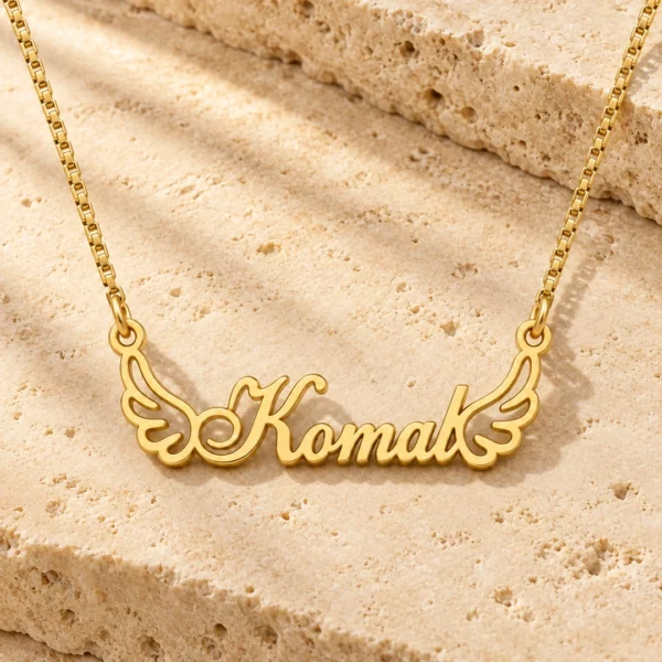 Wings Style Name Necklace gold pendant with original box chain on travertine hero setting