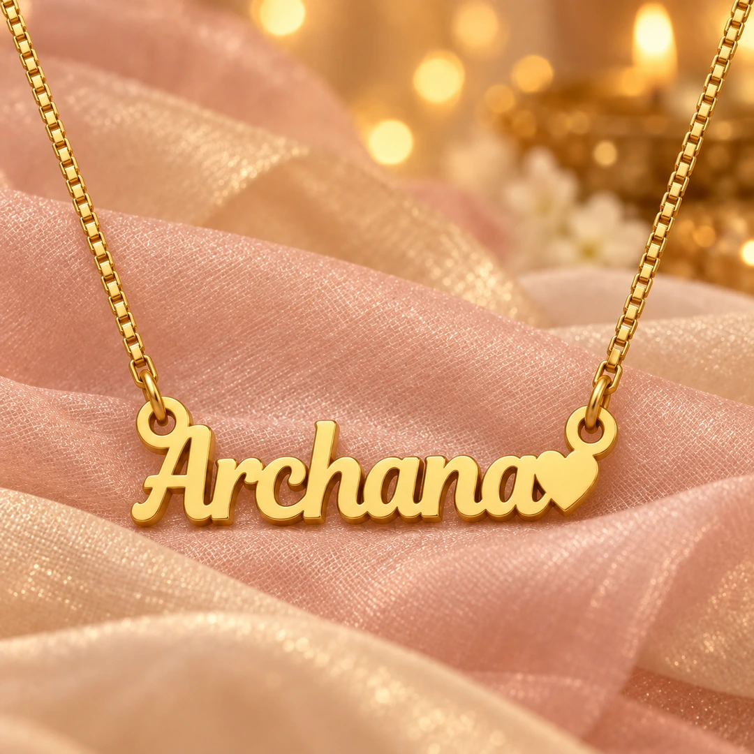 Heart Name Pendant — Blush organza concept Gold Archana name pendant with solid heart and box chain on blush organza