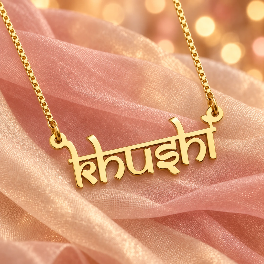 Indian Style Name Necklace - On peach fabric Indian Style Name Necklace on peach fabric