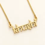 Indian Style Name Necklace on an cream background