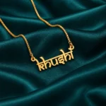 Indian Style Name Necklace on dark green fabric