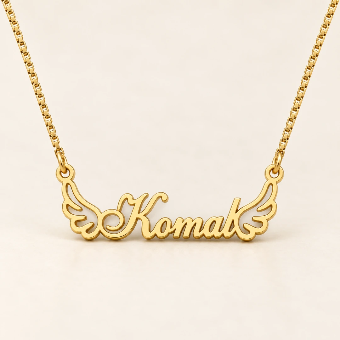 Angel Wings Name Necklace - On an cream background Angel Wings Name Necklace on an cream background