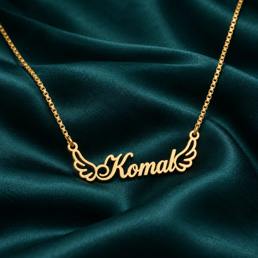 Angel Wings Name Necklace - On dark green fabric Angel Wings Name Necklace on dark green fabric