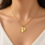 Gold P letter pendant with openwork butterfly wing and fine box chain - model-worn