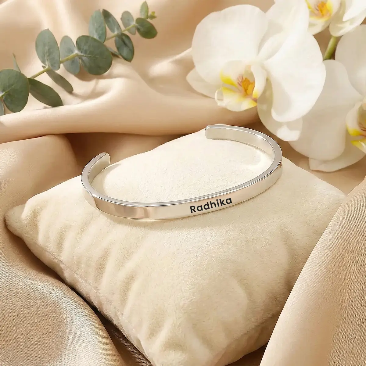 Personalized Silver Finish Adjustable Name Kada - On cream fabric Personalized Silver Finish Adjustable Name Kada on cream fabric