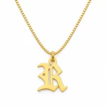 Old English Letter Pendant with a chain on a white background