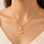 Simple Letter Pendant worn on a fine chain