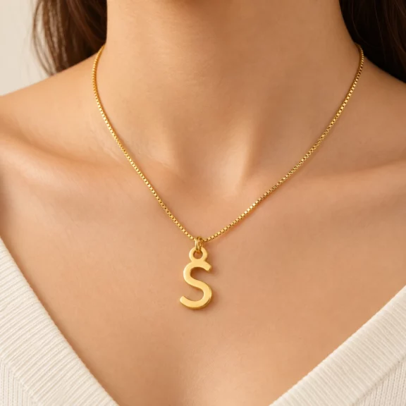 Simple Letter Pendant worn on a fine chain