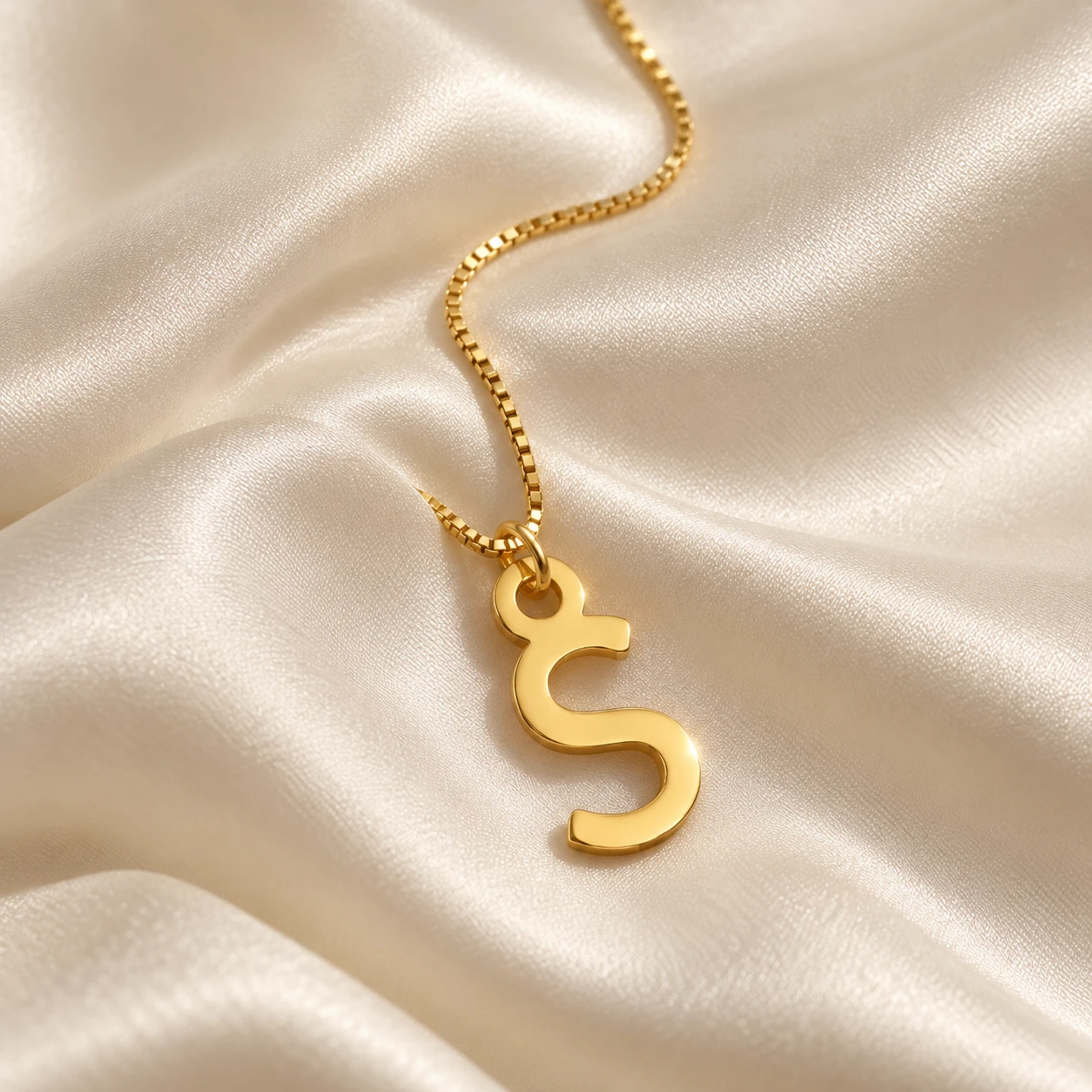 Simple Letter Pendant - With a chain on cream fabric Simple Letter Pendant with a chain on cream fabric