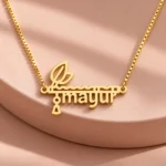 Flute and Feather Name Pendant on a pink display