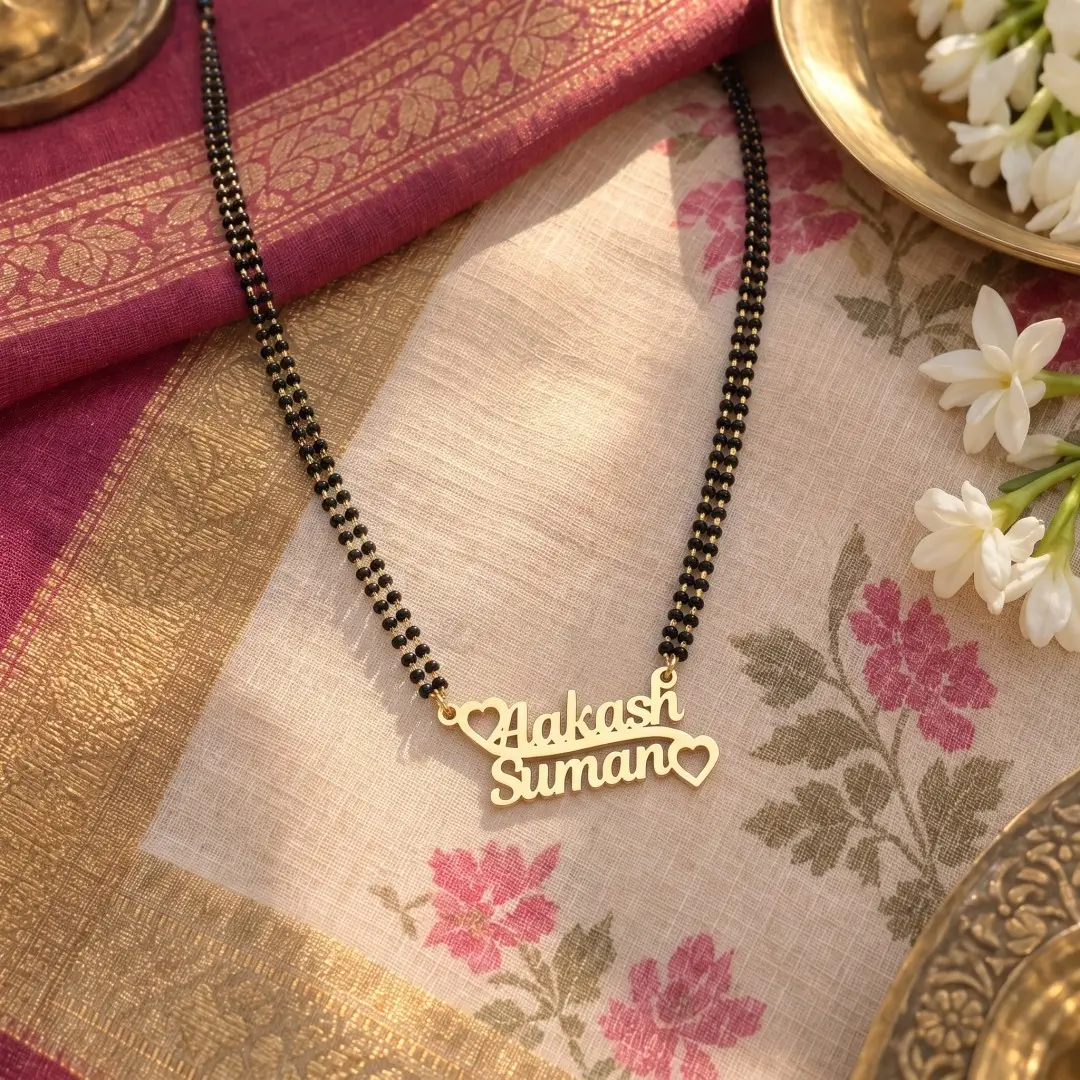 Heart Detail Couple Name Necklace - With a black-beaded chain on floral fabric Heart Detail Couple Name Necklace with a black-beaded chain on floral fabric