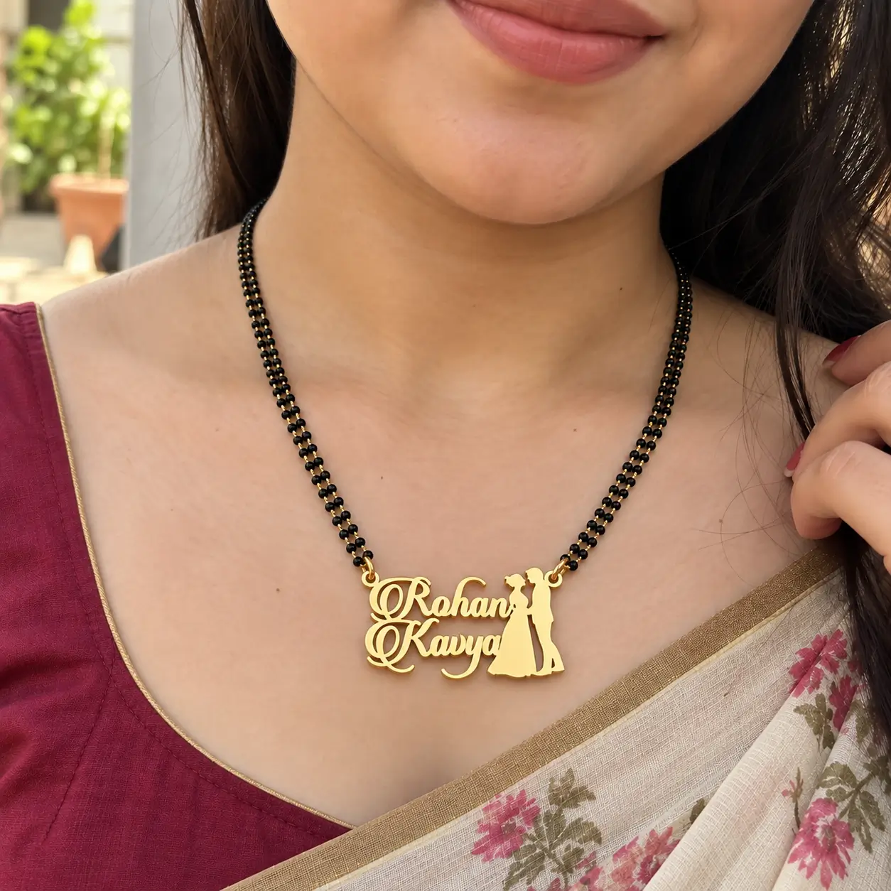 Couple Design Name Necklace - With a black-beaded chain worn with a sari Couple Design Name Necklace with a black-beaded chain worn with a sari