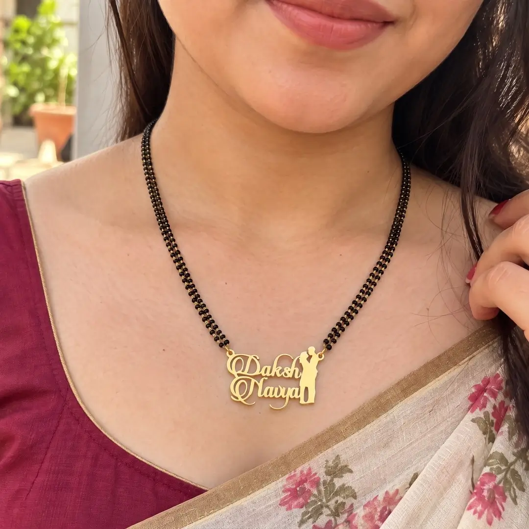 Romantic Couple Design Name Necklace - With a black-beaded chain worn with a sari Romantic Couple Design Name Necklace with a black-beaded chain worn with a sari