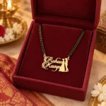 Couple name necklace displayed in a red jewellery box