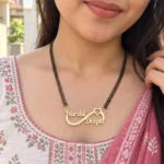 Infinity Heart Couple Name Mangalsutra Pendant with a black-beaded chain shown on a model