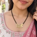 Umbrella Couple Name Necklace with a black-beaded chain shown on a model