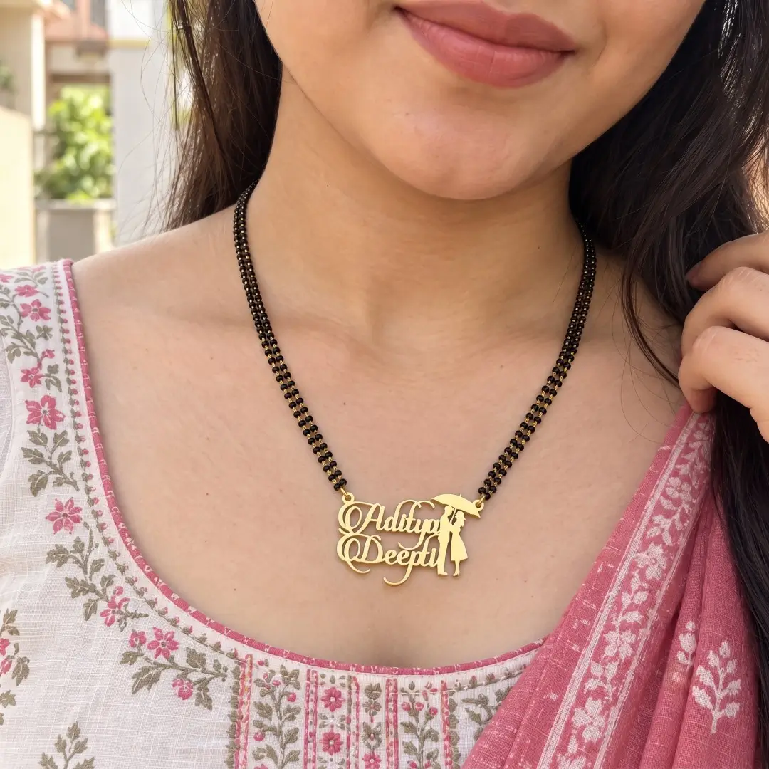 Umbrella Couple Name Necklace - With a black-beaded chain shown on a model Umbrella Couple Name Necklace with a black-beaded chain shown on a model