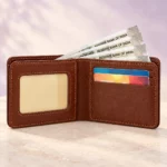 Open brown wallet showing card slots, ID window and cash compartment
