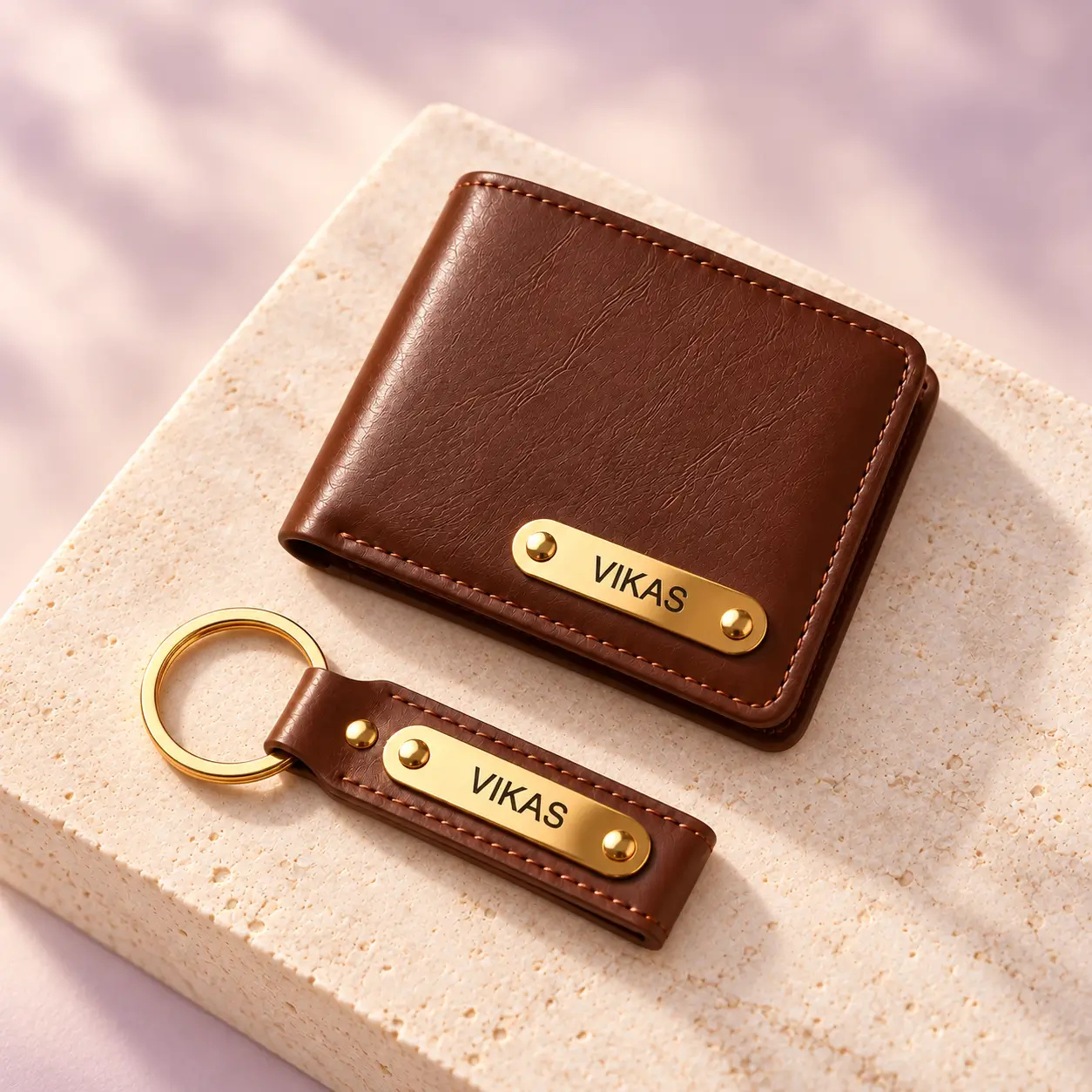 Brown Wallet and Keychain Combo - 4 Personalized brown wallet and keychain displayed on a light stone surface