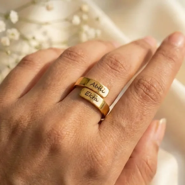 Personalized Engraved Couple Name Ring worn on a finger