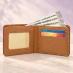 Open tan wallet showing card slots, ID window and cash compartment