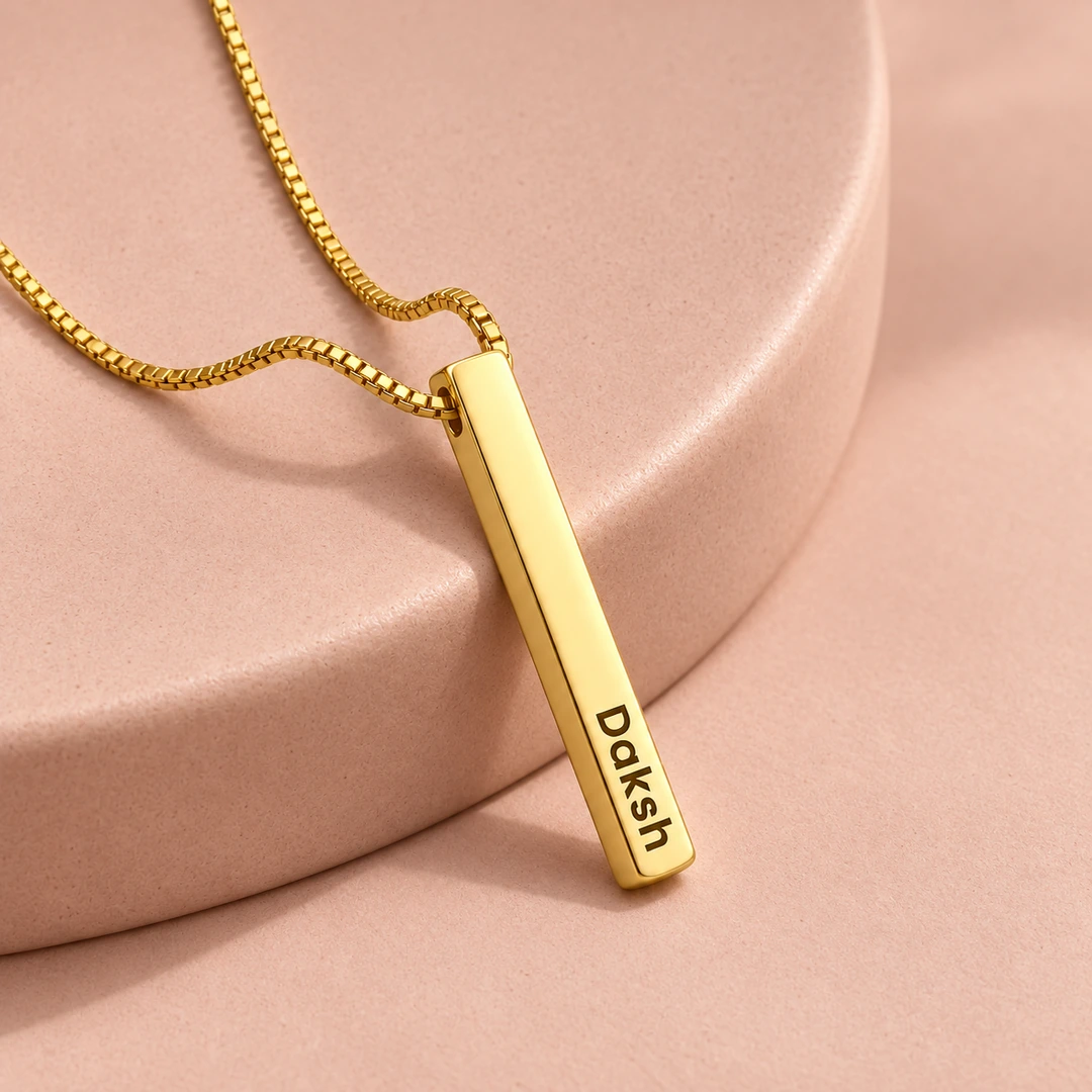 Gold Plated Personalized 3D Bar Pendant - rose ceramic concept Gold Plated Personalized 3D Bar Pendant necklace on rose ceramic surface