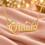 Sparkle Crown Name Necklace on peach fabric