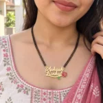 Red Rose Couple Name Necklace with a black-beaded chain shown on a model