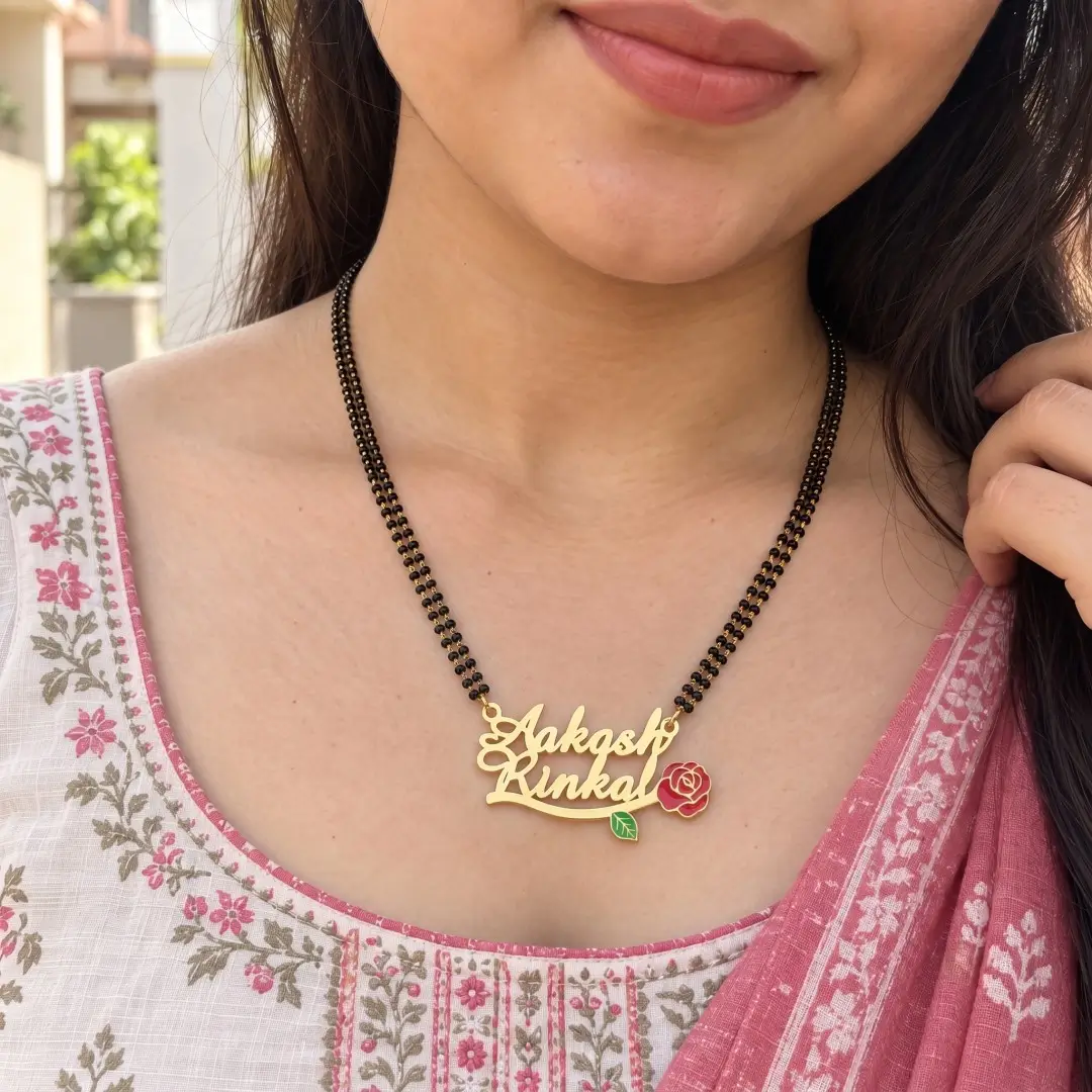 Red Rose Couple Name Necklace - With a black-beaded chain shown on a model Red Rose Couple Name Necklace with a black-beaded chain shown on a model