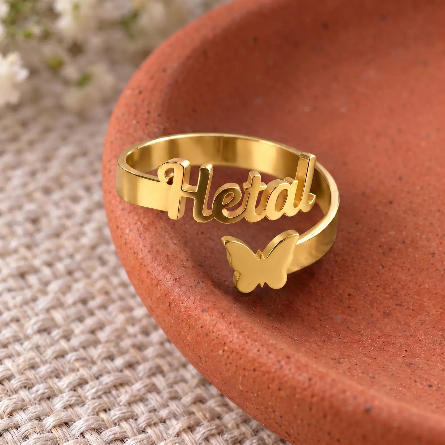 Personalized Butterfly Name Ring – Image 5 Personalized Butterfly Name Ring displayed on a terracotta dish