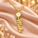 Flower Drop Name Necklace on peach fabric