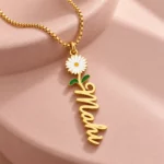 Flower Drop Name Necklace on a pink display