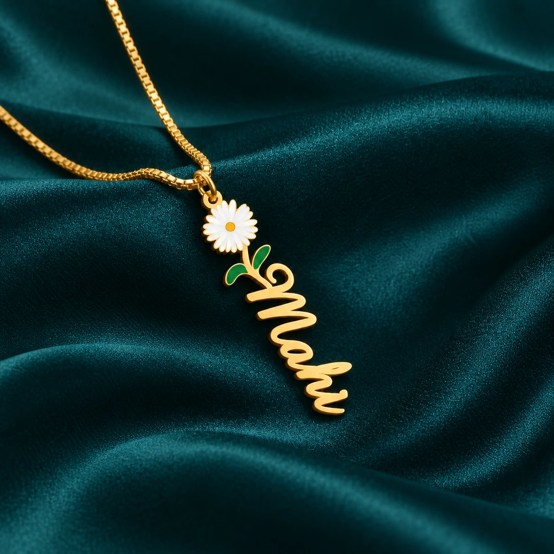 Flower Drop Name Necklace - On dark green fabric Flower Drop Name Necklace on dark green fabric