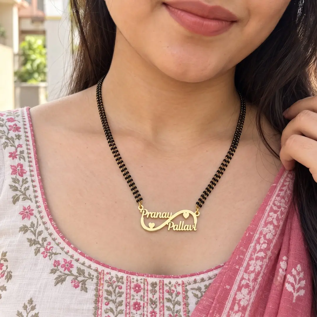 Custom Infinity Couple Name Necklace - 1 Custom infinity couple name necklace with black bead chain worn with a floral outfit