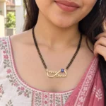 Blue Evil Eye Infinity Couple Name Necklace with a black-beaded chain shown on a model