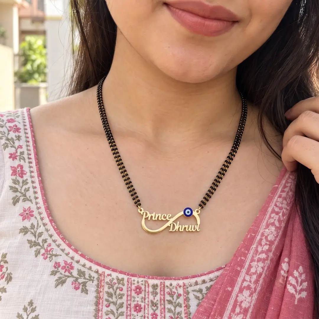 Blue Evil Eye Infinity Couple Name Necklace - With a black-beaded chain shown on a model Blue Evil Eye Infinity Couple Name Necklace with a black-beaded chain shown on a model