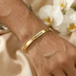 Personalized Golden Name Bracelet worn on a wrist