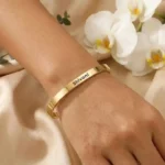 Personalized Golden Name Bracelet shown on a wrist from another angle